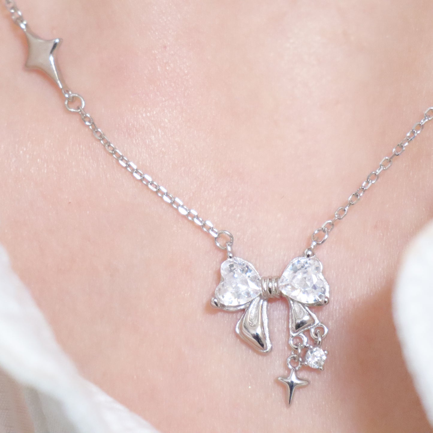 Stellar Solid Silver Bow and Star Necklace