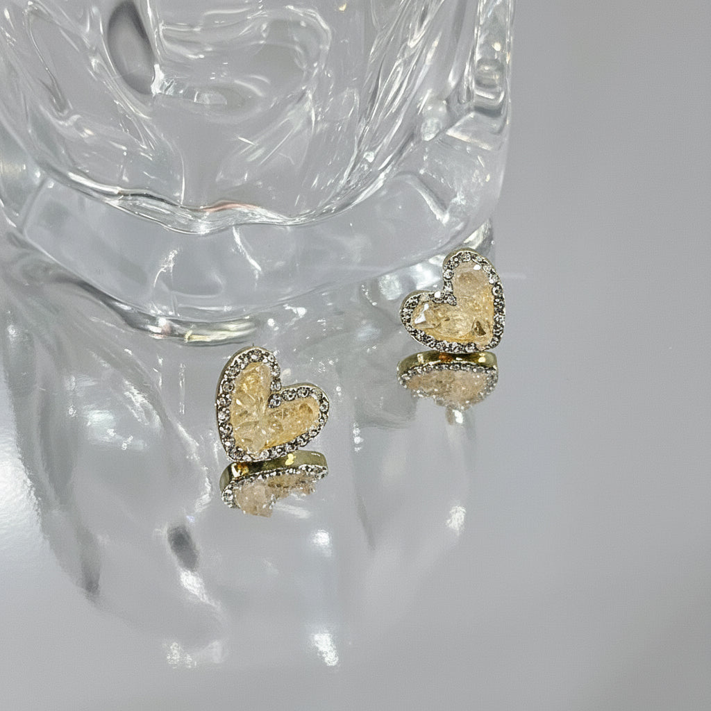 Gold heart shaped earrings / ear clips, Filled with light Yellow crystals, Encrusted with zirconia.