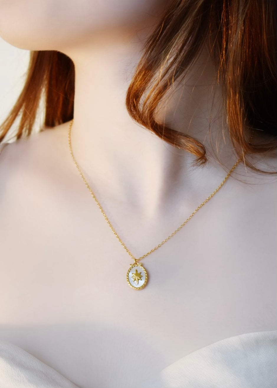 Star Framed Gold Oval Pendant Necklace