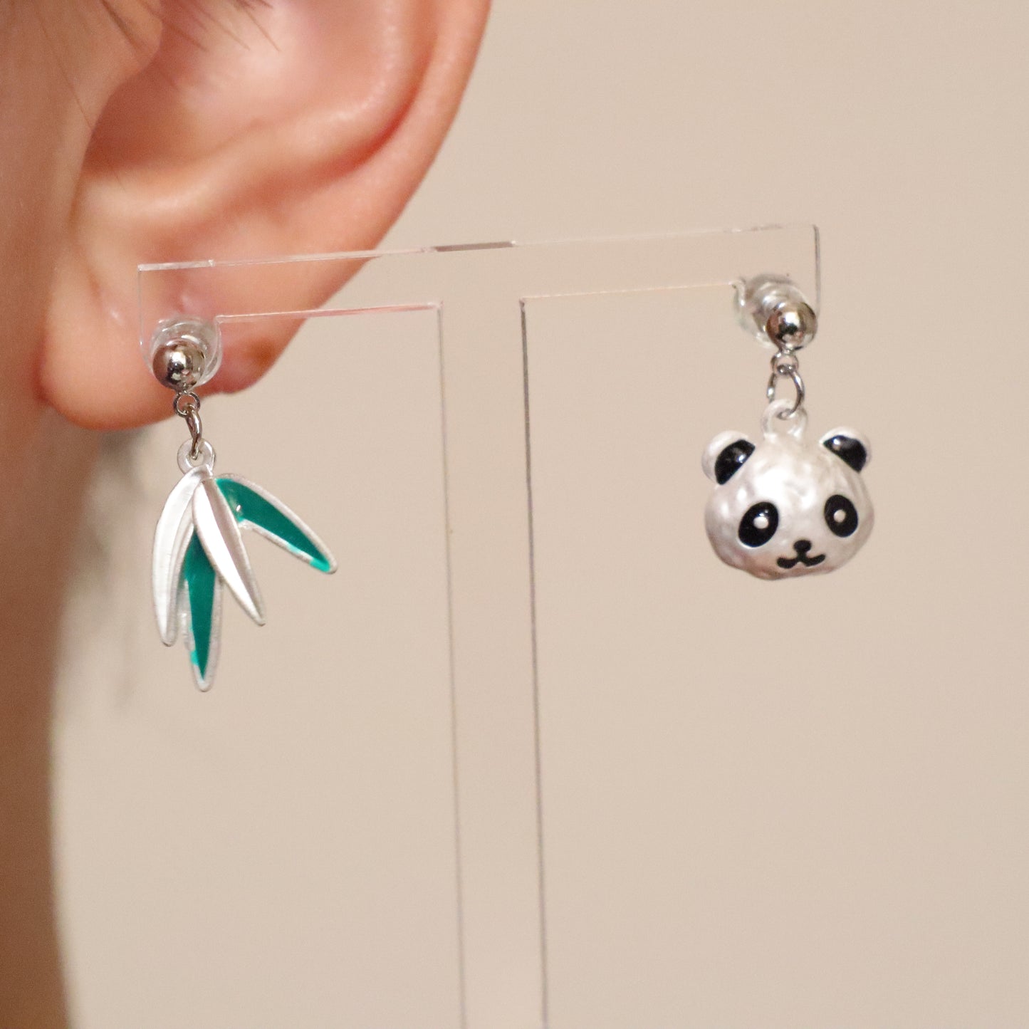 Asymmetrical pandas and bamboo earrings