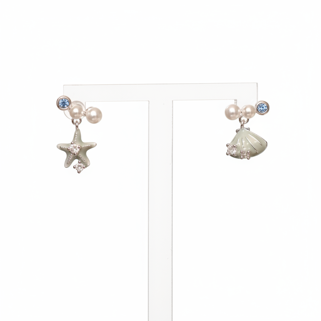 Asymmetrical starfish and shells earrings