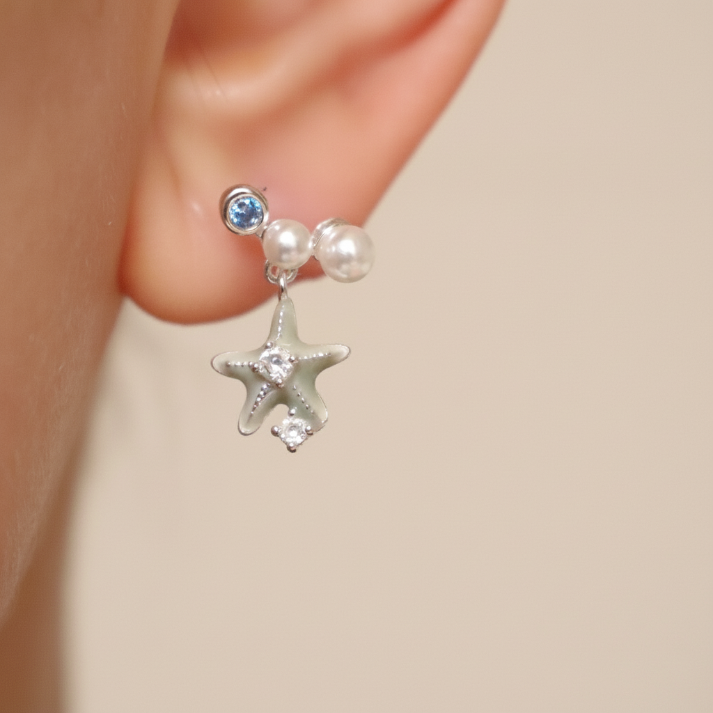 Asymmetrical starfish and shells earrings