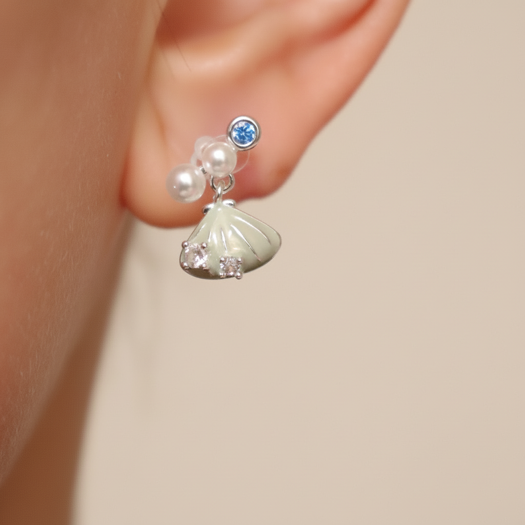 Asymmetrical starfish and shells earrings